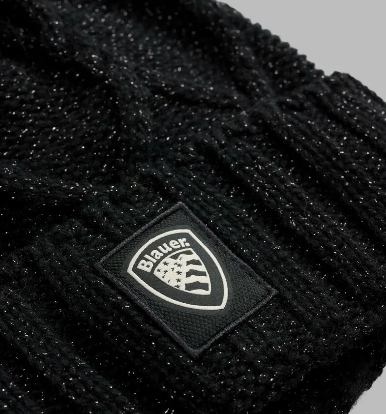 BERRETTO BLAUER USA CON TRECCE E PON PON DACIA